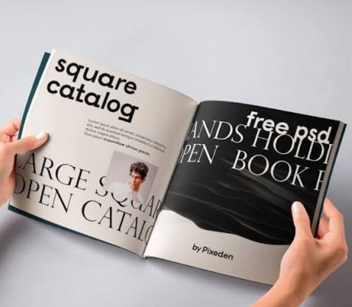 Hand Holding Square Magazine Mockup