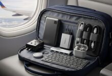 Thumbnail showing a personal item bag packed with 7 compact travel gadgets including power bank, adapter, and earbuds.