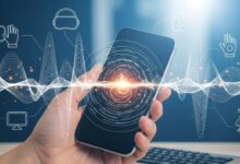 Illustration of a hand holding a smartphone with digital vibrations, representing haptics and touch technology across devices.